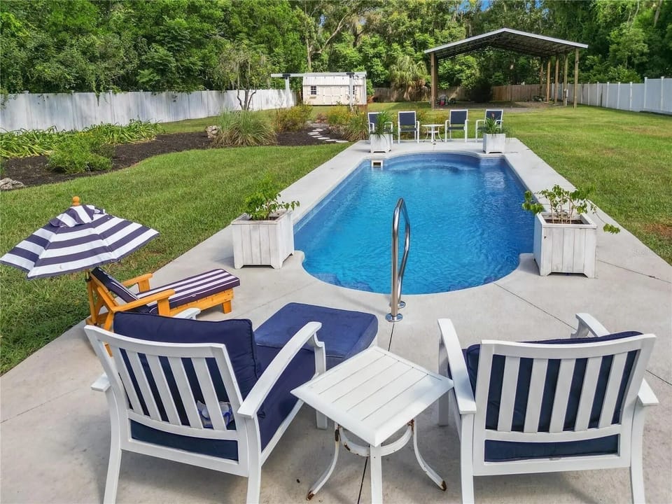 Private back yard with garden and saltwater pool