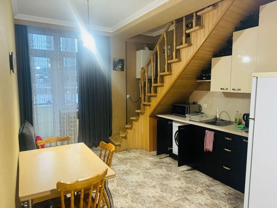 Room, City View | Private kitchen | Stovetop, cleaning supplies, freezer