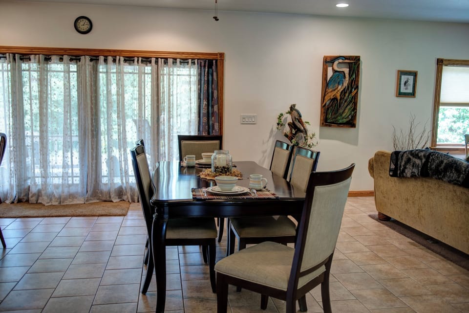 Inviting dining space.  Good for a big meal or playing board games.