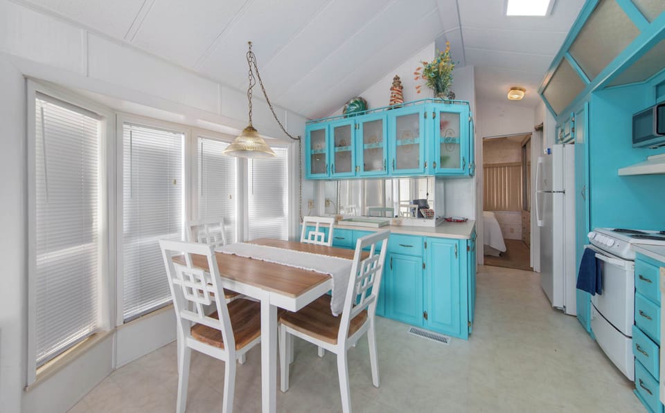 Share meals at the dining table just off the kitchen