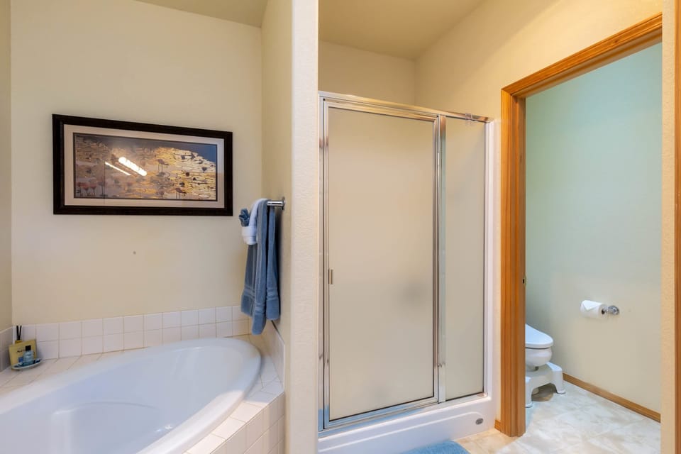 Master bedroom has a standing shower.