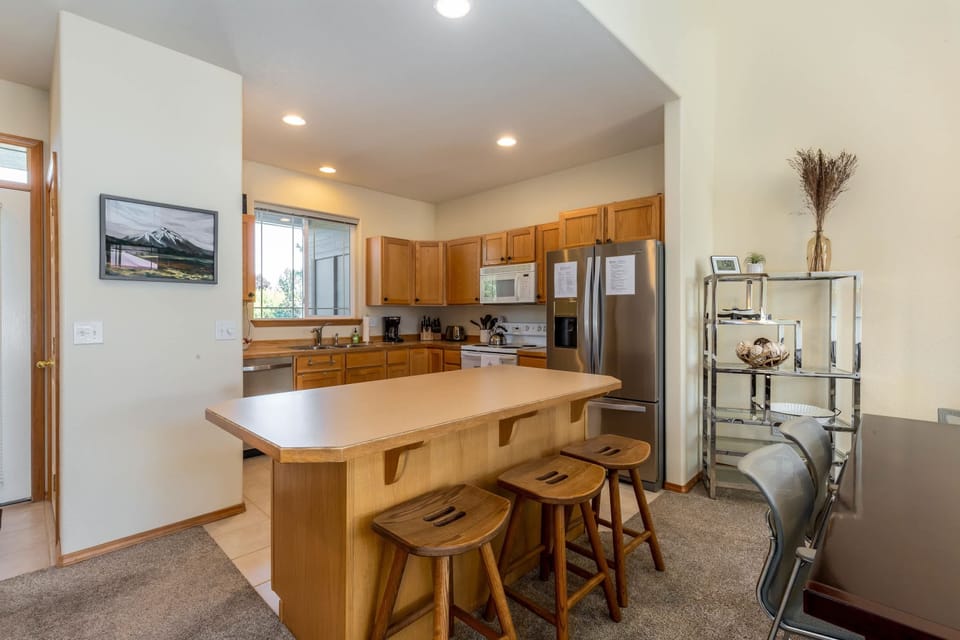 Kitchen island with bar stools.