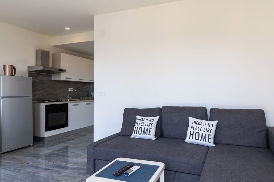 Apartment (Begović Guest House - One-Bedroom Ap) | Living room | 32-inch flat-screen TV with cable channels