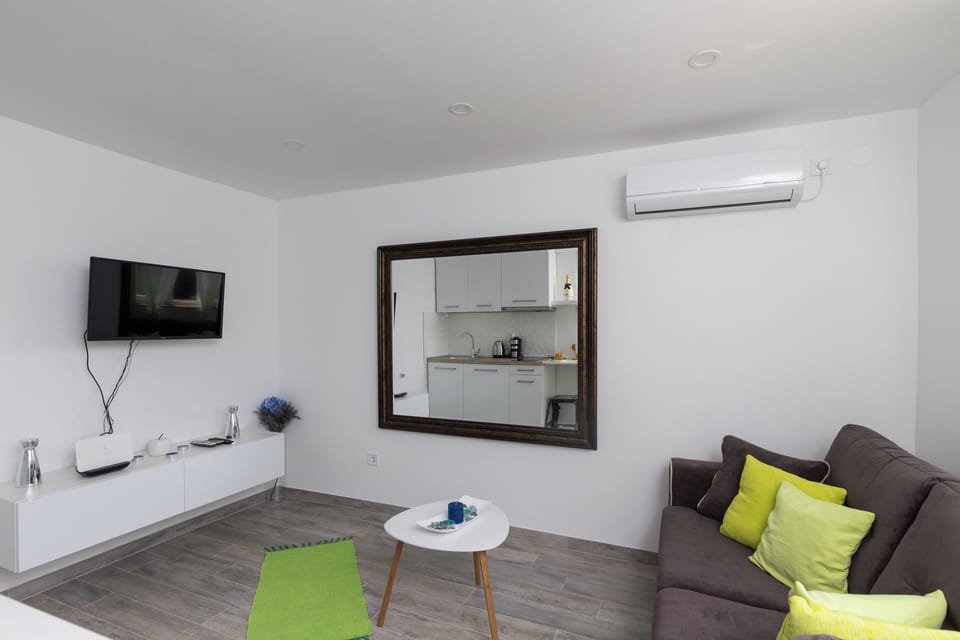 Apartment (One Bedroom Apartment with Terrace an) | Living room | 32-inch flat-screen TV with digital channels