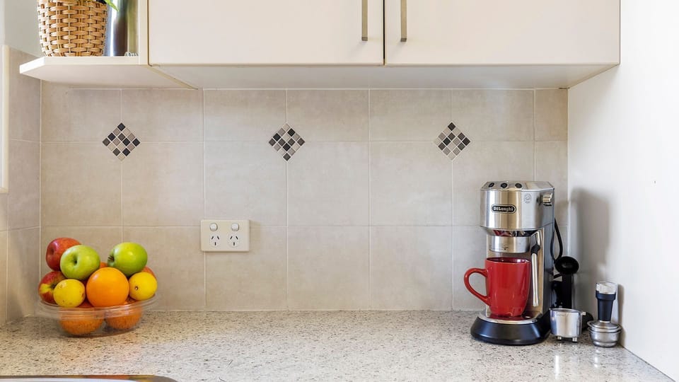 Beachside at Gretel | DeLonghi Coffee Machine 