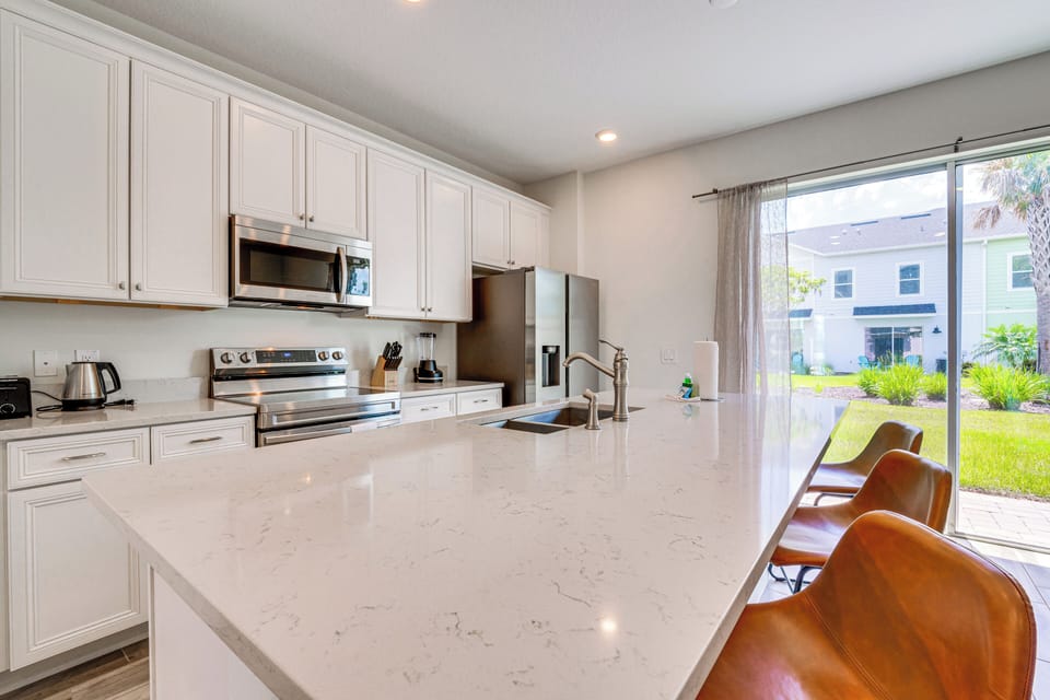 Breakfast Bar | Dishware & Flatware Provided | Central A/C & Heat | 1st Floor