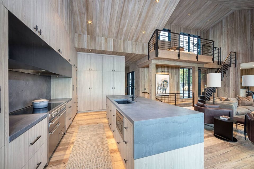 The open concept living space seamlessly integrates the kitchen and living room.