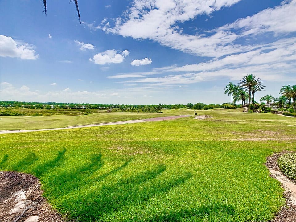 Wake up to wide-open views and stunning skies over the lush golf course