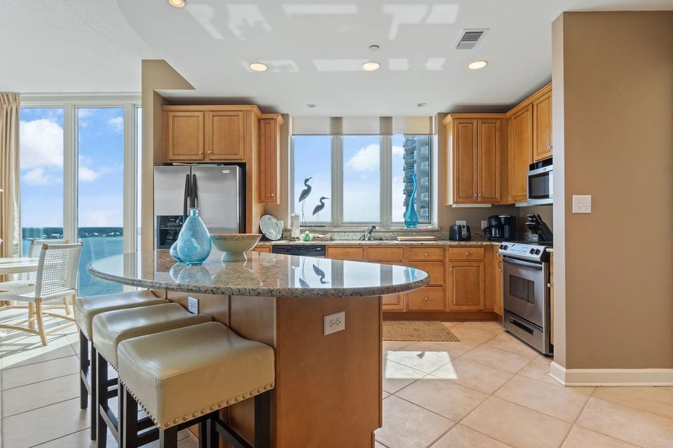 Condo, Multiple Beds (Lagoon Tower 1002) | Private kitchen | Oven, toaster, paper towels