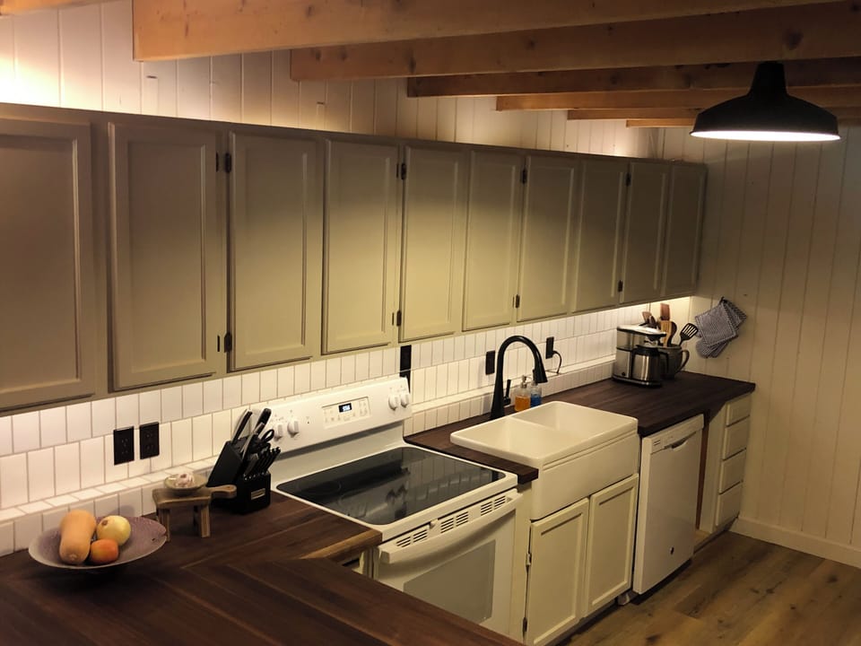 Kitchen with walnut counters & farmhouse sink offering crisp mountain well water