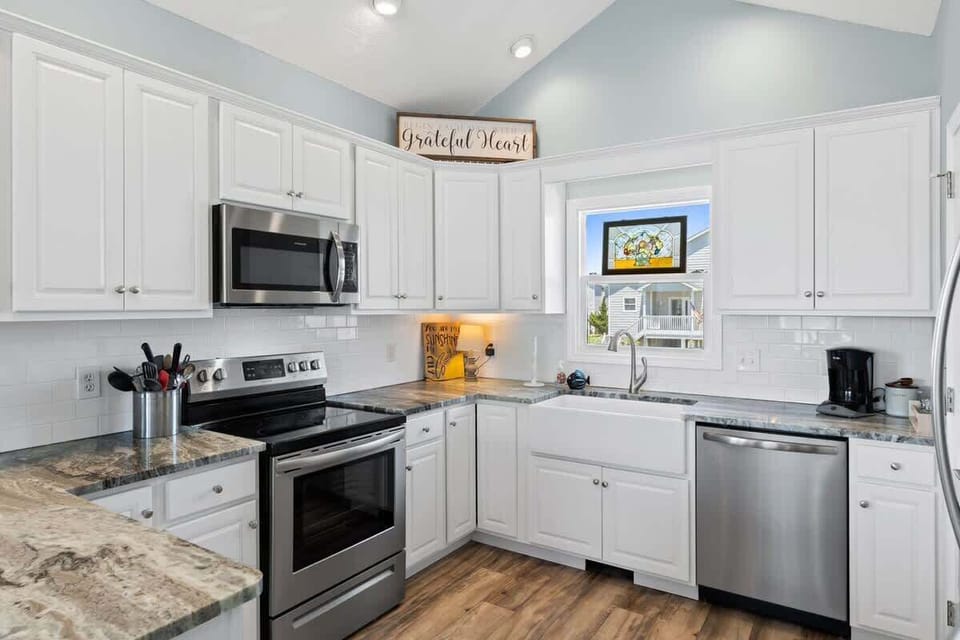 Well-equipped kitchen provides everything needed for meals, snacks, and family gatherings.