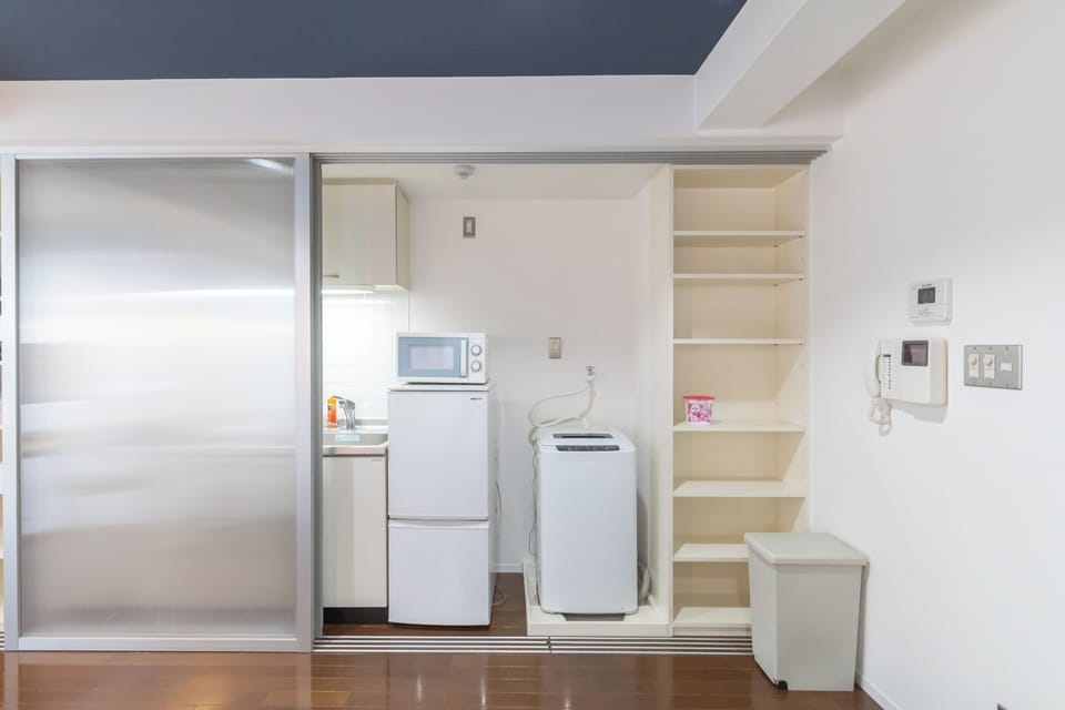 Design Apartment | Private kitchen | Full-size fridge, microwave, stovetop, toaster