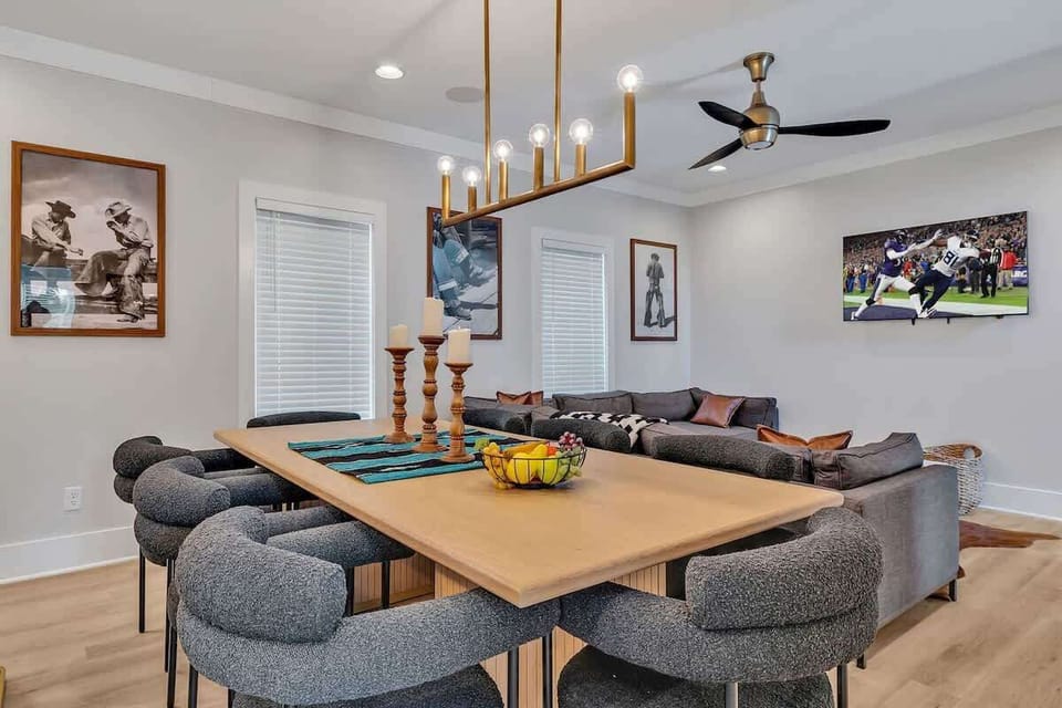 2nd Floor: Formal dining table between the living room and kitchen offering a large table to accommodate 8 guests.