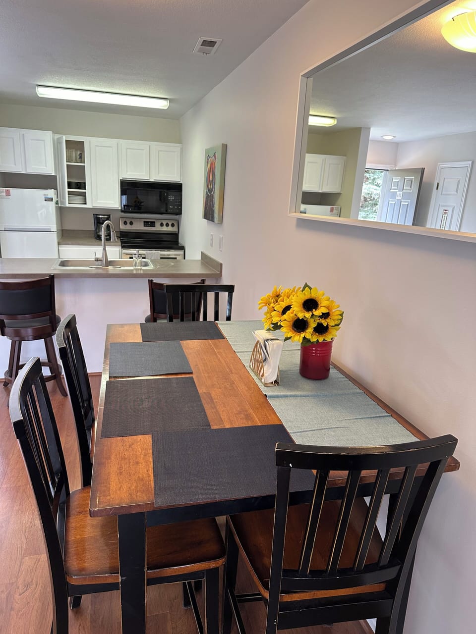 Dining table. Bar-height table with four big chairs.