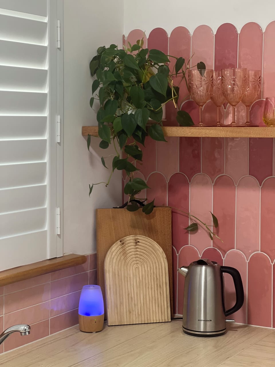 plantation shutters give the fresh clean beach vibe.