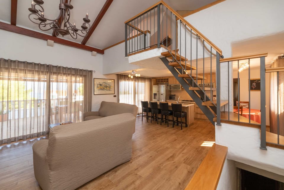 Villa (Four bedroom Villa with Swimming pool) | Living room | 32-inch flat-screen TV with satellite channels