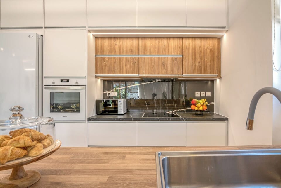 The kitchen is equipped with all the modern appliances.