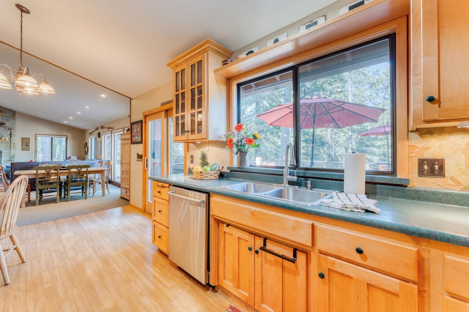 Bright kitchen with beautiful outdoor scenery.