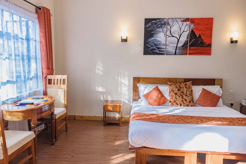 Deluxe Double or Twin Room, Balcony, Garden View | Laptop workspace, blackout drapes, soundproofing, cribs/infant beds