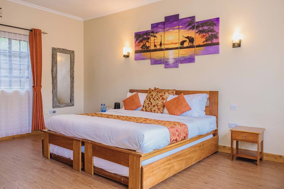 Deluxe Double or Twin Room, Balcony, Garden View | Laptop workspace, blackout drapes, soundproofing, cribs/infant beds