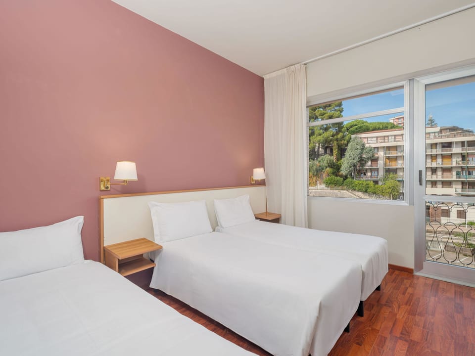Standard Triple Room | In-room safe, desk