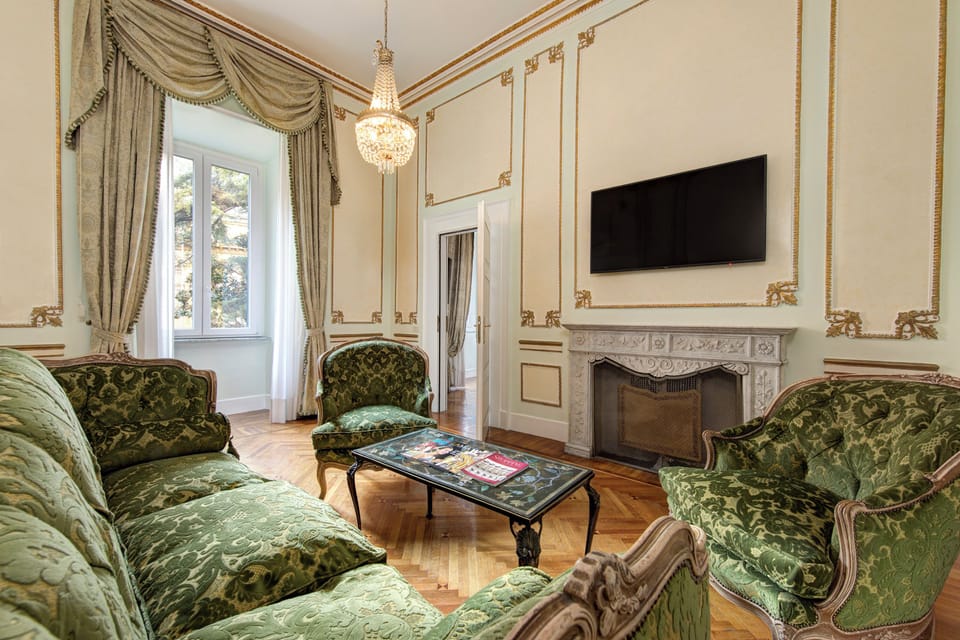 Suite, 1 Queen Bed | In-room safe, desk, blackout drapes, iron/ironing board
