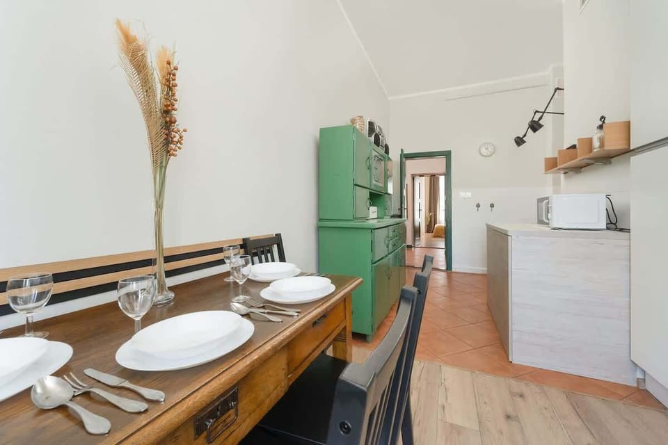 Independent kitchen with dining area.