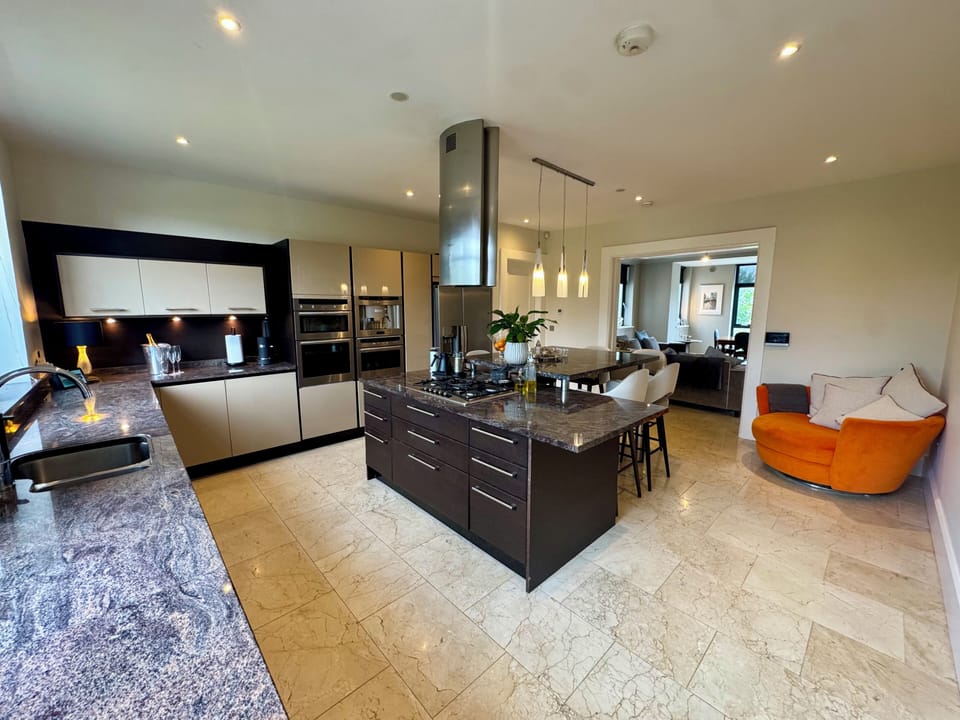 Designer Kitchen with Casual Dining Seating for Eight