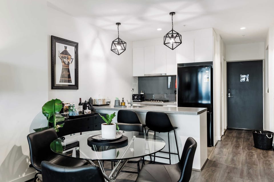Contemporary kitchen with modern appliances, cookware, and all essentials for your stay