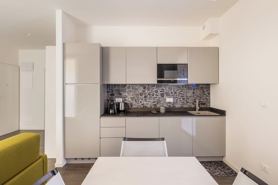 Apartment | Private kitchen | Stovetop, espresso maker, electric kettle