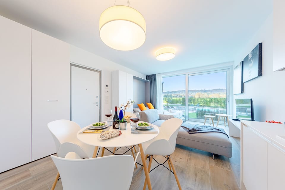 Condo, Pool View | Living area | 35-inch TV with digital channels