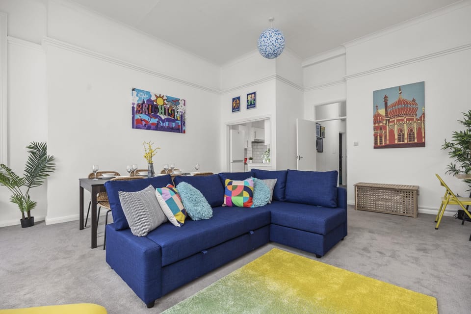Living room area with a Smart TV and plush seating, ideal for relaxation