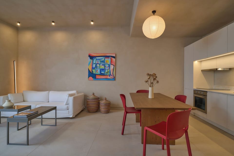 The "1st suite" features a living room area, with fully equipped kitchen.