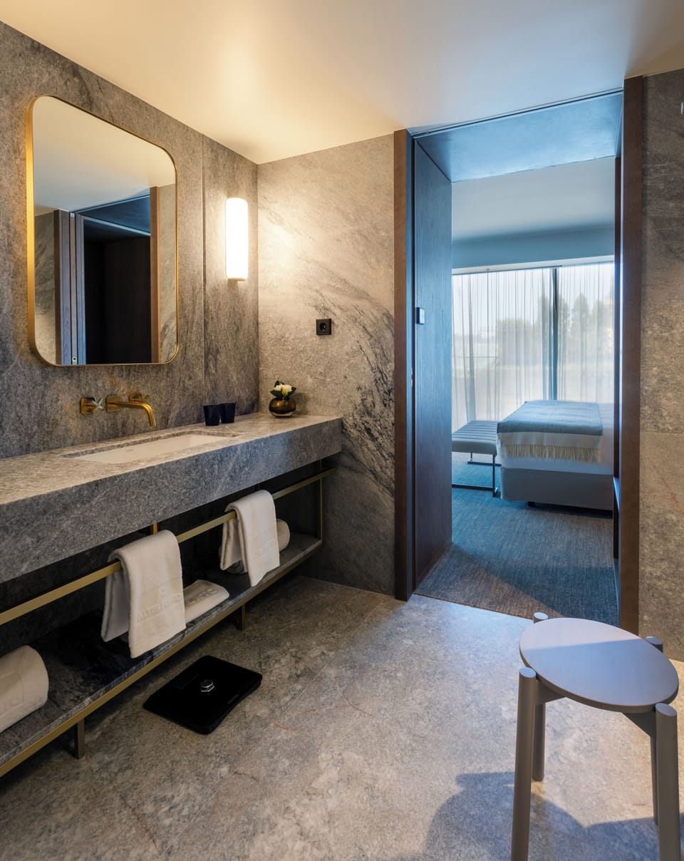 Suite, River View | Bathroom | Shower, designer toiletries, hair dryer, bathrobes