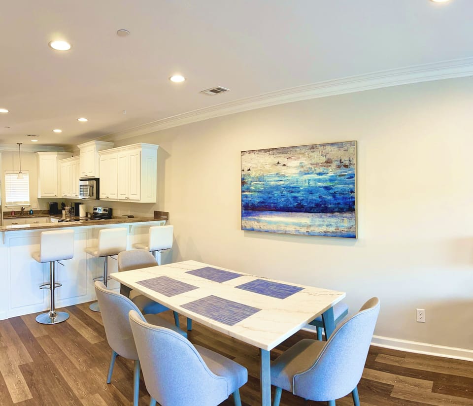 Gather around the lovely dining area to enjoy your favorite meals.