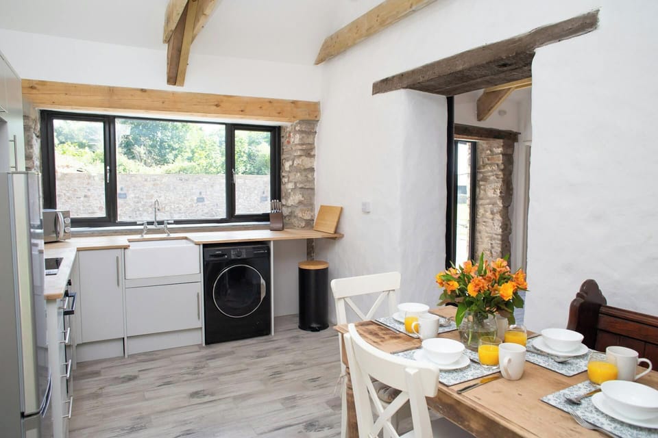 Kitchen with Patio doors leading to the garden