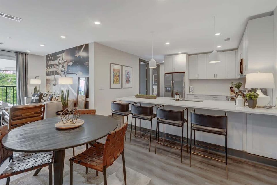 Dining Area: Modern elegance meets Nashville charm with a stylish table and inviting decor!