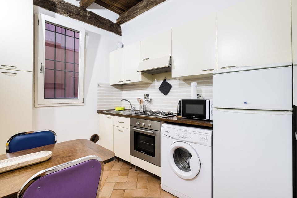 Apartment | Private kitchen | Espresso maker, coffee/tea maker, electric kettle, dining tables