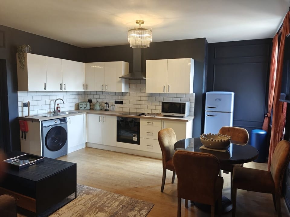 Classic Apartment | Living area | 42-inch Smart TV with digital channels, iPod dock, pay movies