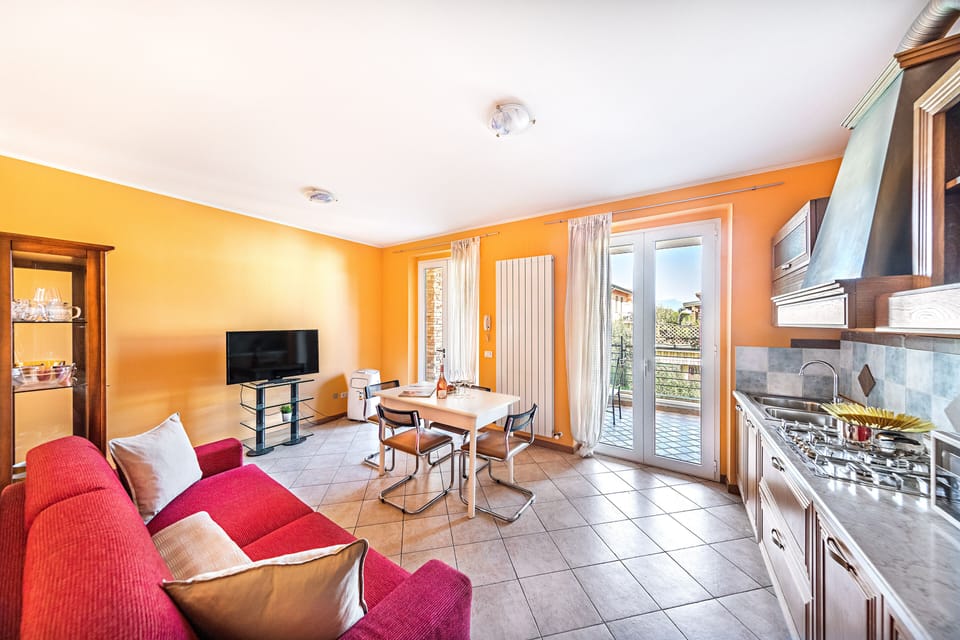 Apartment | Living area | 35-inch flat-screen TV with digital channels