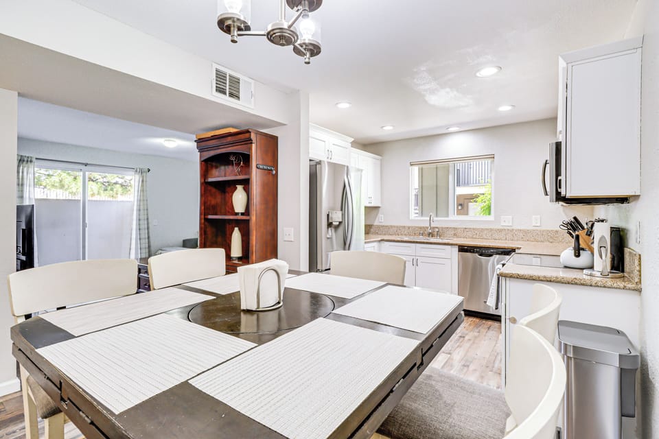 Kitchen & Dining Area | In-Unit Laundry | Central Heating & A/C
