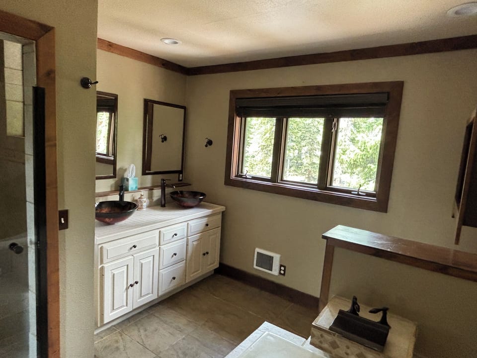 Bathroom off upper main suite.