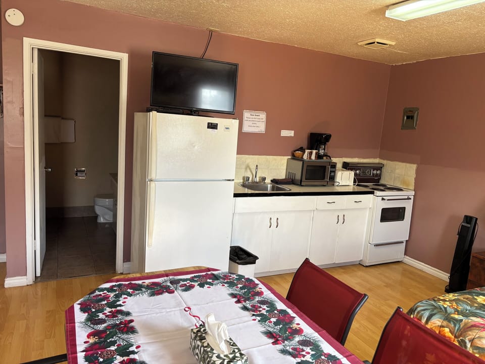 Deluxe Room, Multiple Beds, City View | Private kitchenette | Coffee/tea maker, mini-fridge, microwave, toaster