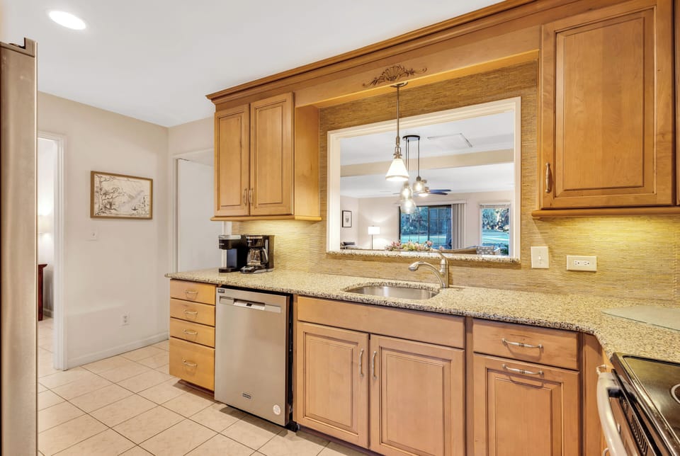 Plenty of counter space and dinnerware to indulge in a vacation style meals