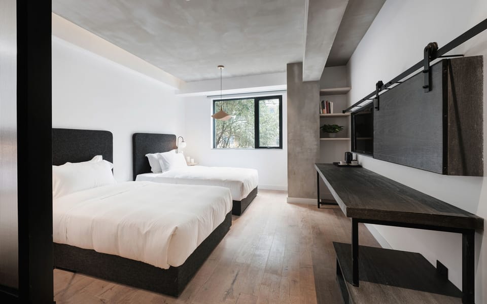 City Twin Room | Desk, blackout drapes, iron/ironing board (on request), WiFi (free)