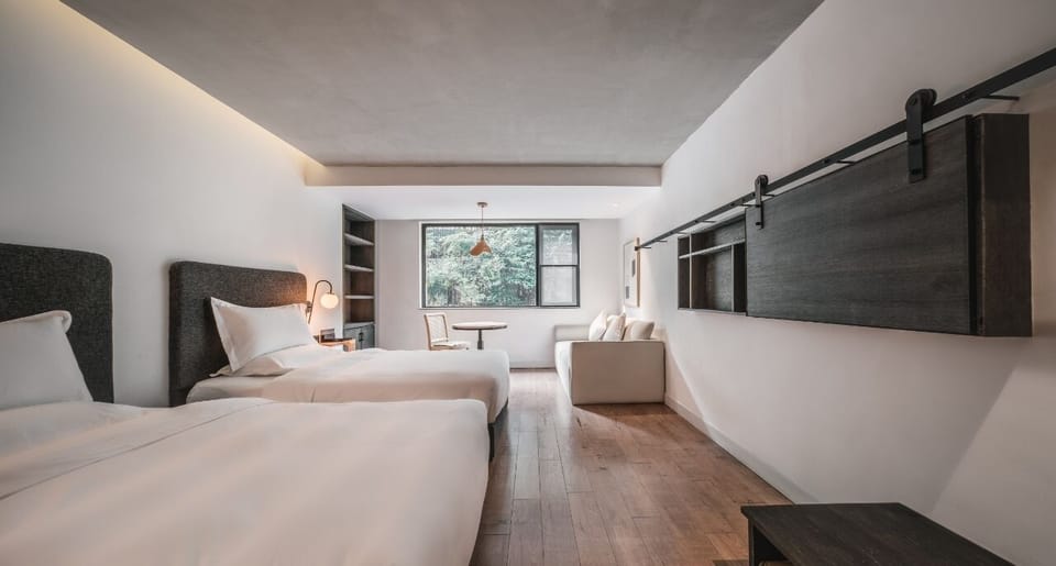 City Twin Room | Desk, blackout drapes, iron/ironing board (on request), WiFi (free)