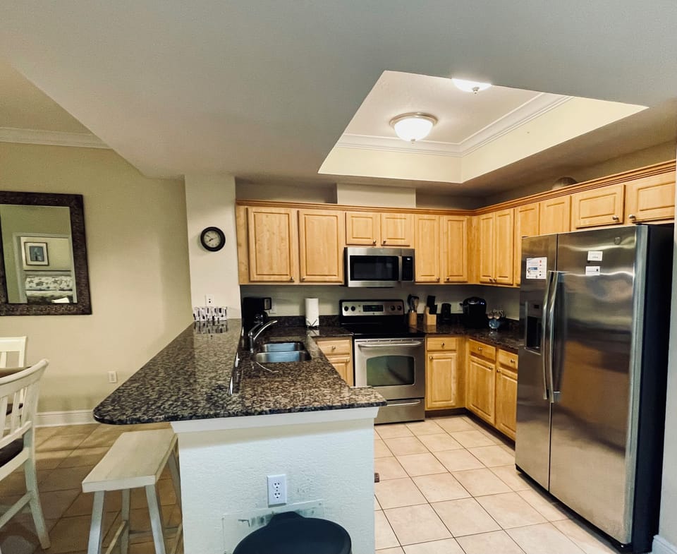 Fully equipped kitchen with Keurig & regular coffeemaker, cookware, dinnerware. 