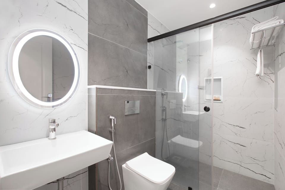 Premium Double Room | Bathroom | Rainfall showerhead, free toiletries, hair dryer, slippers