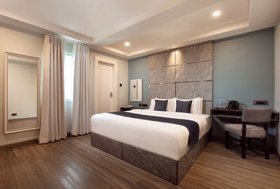 Studio | Premium bedding, desk, laptop workspace, soundproofing