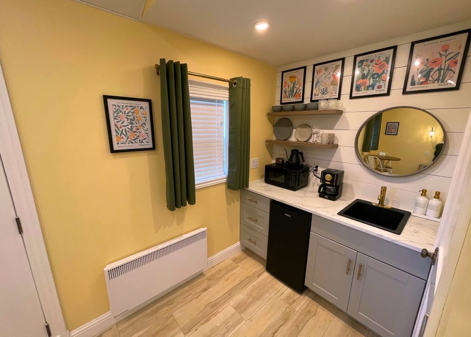 View of the kitchenette &  heater window overlooking the garden.